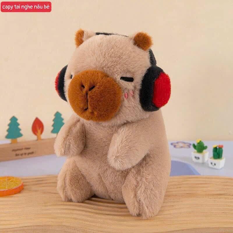 CAPIBARA DE PELUCHE CON OREJERAS